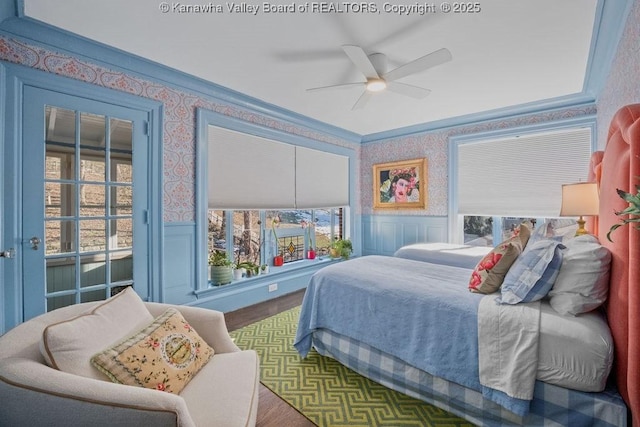 bedroom featuring hardwood / wood-style floors, access to outside, ornamental molding, and ceiling fan