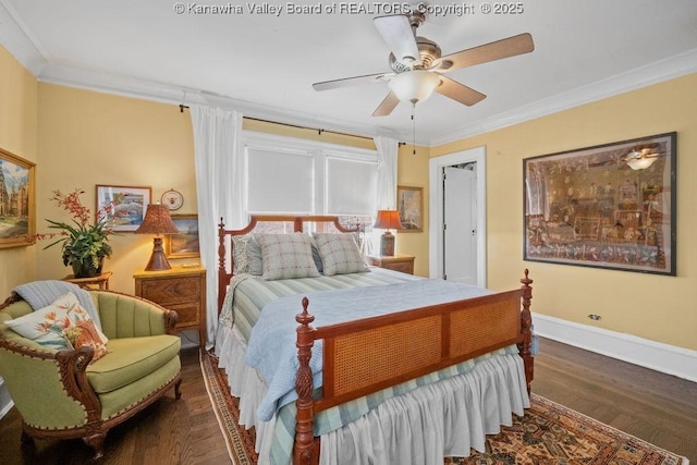 bedroom with crown molding, dark hardwood / wood-style floors, and ceiling fan