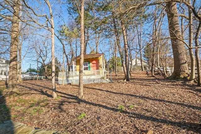 view of yard featuring a deck