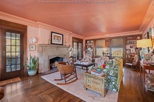 living room featuring crown molding and dark wood-type flooring