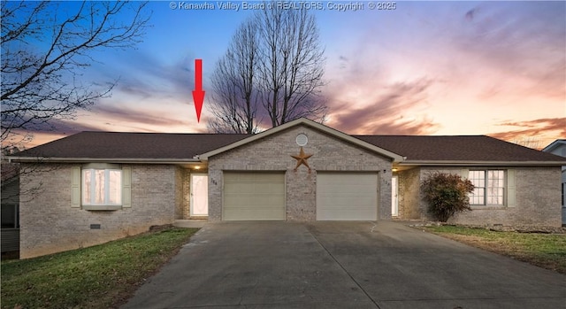 single story home with a garage