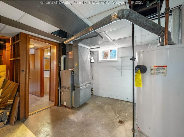 basement featuring heating unit and water heater