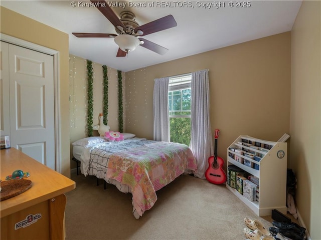 bedroom with carpet floors and ceiling fan