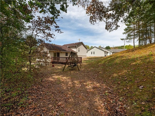 view of yard with a deck