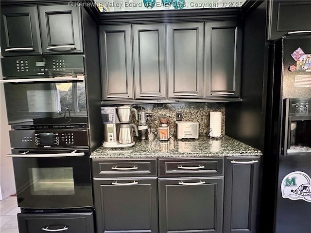 kitchen with stone counters, backsplash, and black appliances