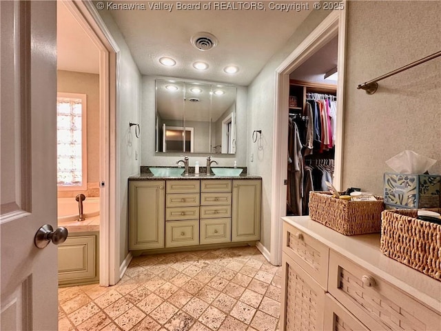 bathroom featuring vanity