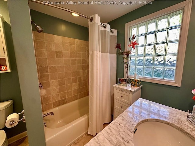 full bathroom featuring vanity, toilet, and shower / bath combo with shower curtain