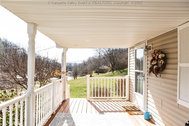 wooden deck featuring a porch