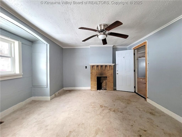 unfurnished living room with light colored carpet, a brick fireplace, a textured ceiling, ornamental molding, and ceiling fan