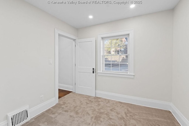 spare room with carpet flooring