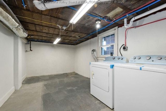 laundry room with washer and clothes dryer