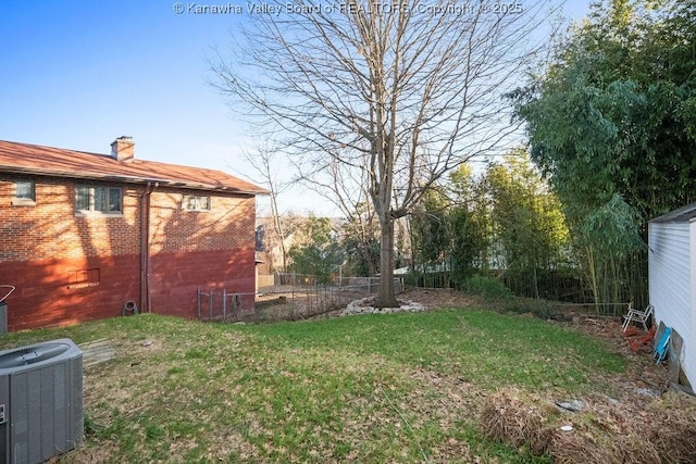 view of yard featuring central AC