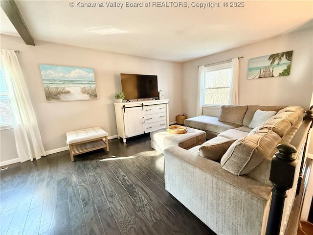 living room with beam ceiling and dark wood-type flooring