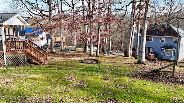 view of yard with a wooden deck