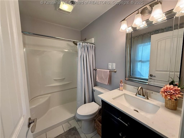 bathroom with vanity, toilet, and a shower with shower curtain