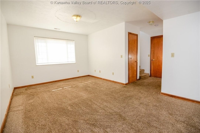 view of carpeted spare room