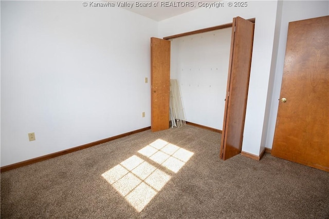 unfurnished bedroom featuring a closet and carpet