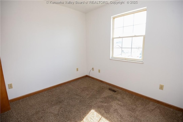 view of carpeted spare room