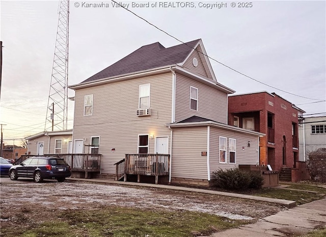 exterior space featuring cooling unit