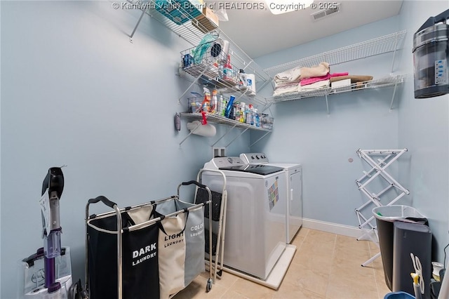 laundry area featuring washer and clothes dryer