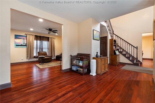 entrance foyer with ceiling fan and dark hardwood / wood-style floors