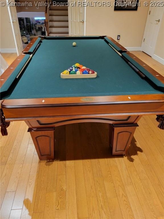 game room featuring pool table and light hardwood / wood-style flooring