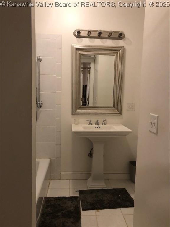 bathroom with plus walk in shower and tile patterned flooring