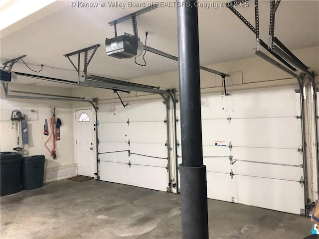 garage featuring a garage door opener