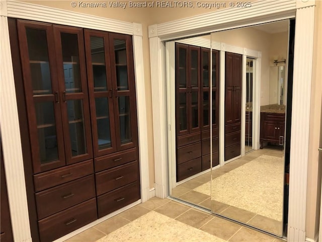 interior space featuring light tile patterned floors