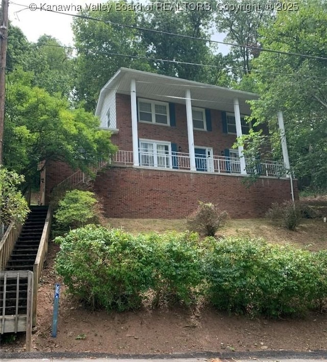 view of home's exterior with covered porch