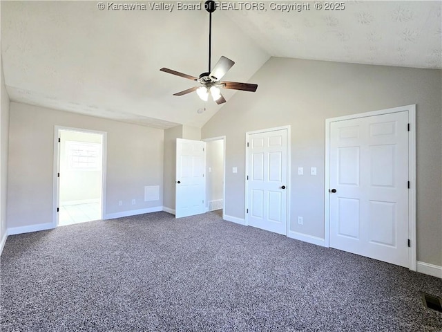 100 Oak Ridge Ln, Huntington, WV 25704 - unfurnished bedroom featuring ceiling fan, carpet flooring, two closets, and high vaulted ceiling