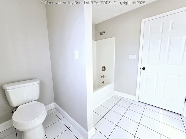 100 Oak Ridge Ln, Huntington, WV 25704 - bathroom featuring tub / shower combination, tile patterned floors, and toilet