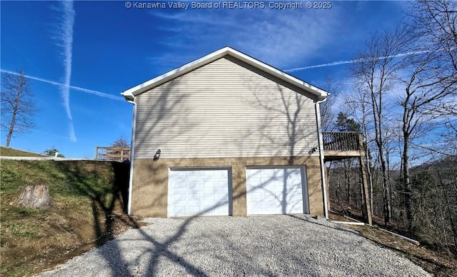 100 Oak Ridge Ln, Huntington, WV 25704 - view of side of home with a garage