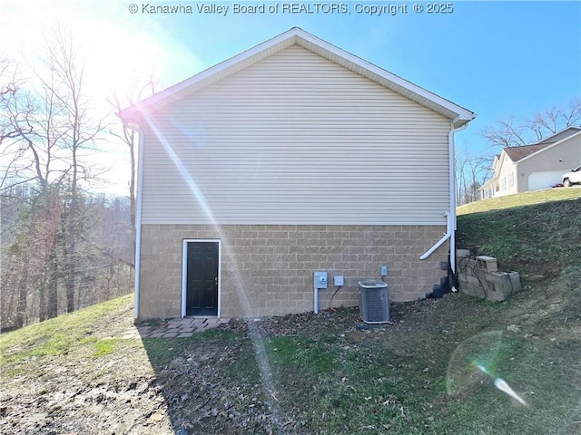 100 Oak Ridge Ln, Huntington, WV 25704 - view of home's exterior with central AC unit and a lawn
