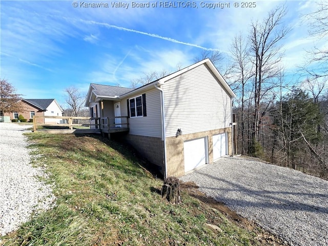100 Oak Ridge Ln, Huntington, WV 25704 - view of home's exterior featuring a garage
