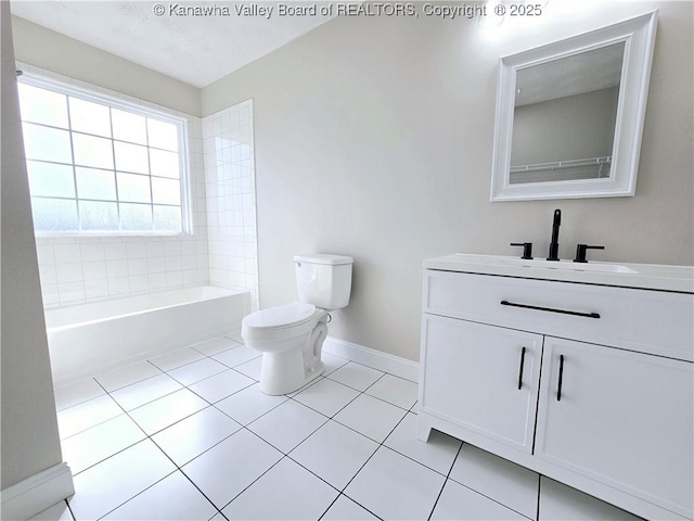 100 Oak Ridge Ln, Huntington, WV 25704 - bathroom featuring vanity, toilet, tile patterned flooring, and a bath