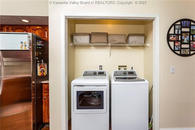 laundry area with washer and clothes dryer