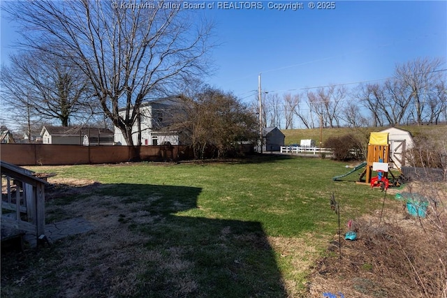 view of yard featuring a playground