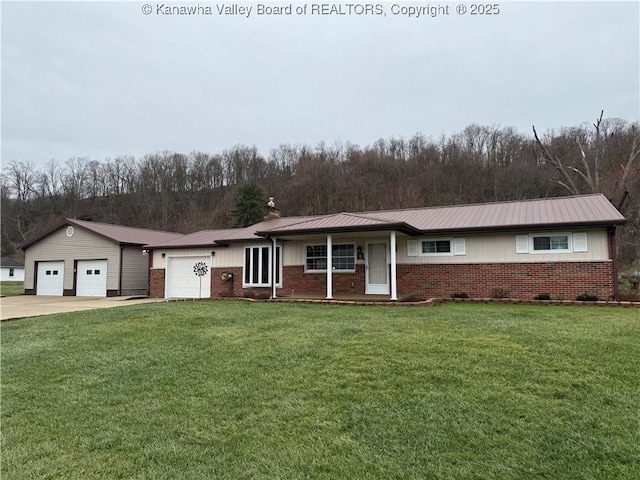 ranch-style house with a front yard and a garage