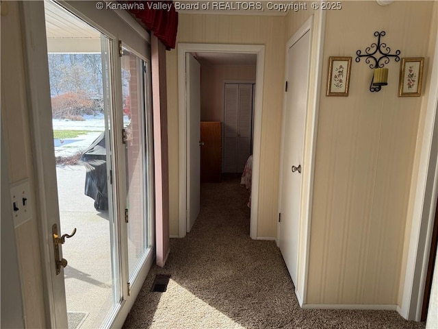 corridor featuring carpet