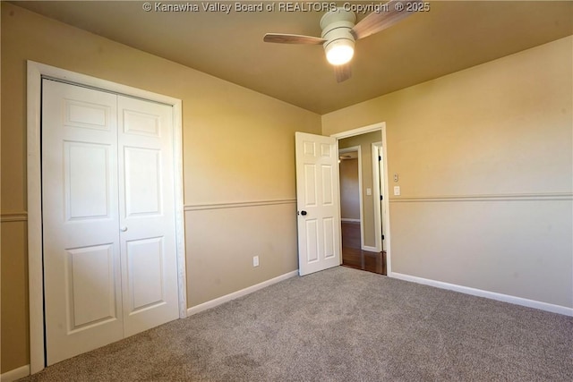 unfurnished bedroom with a closet, ceiling fan, and carpet floors