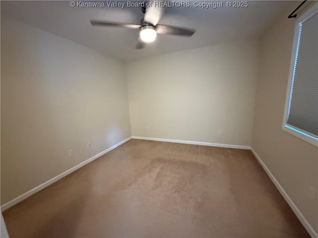 carpeted empty room with ceiling fan