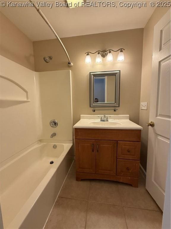 bathroom with shower / bathing tub combination, vanity, and tile patterned flooring