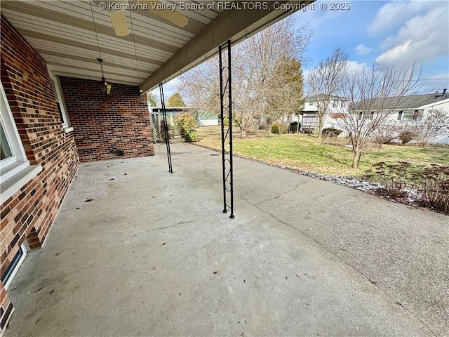 view of patio / terrace featuring ceiling fan