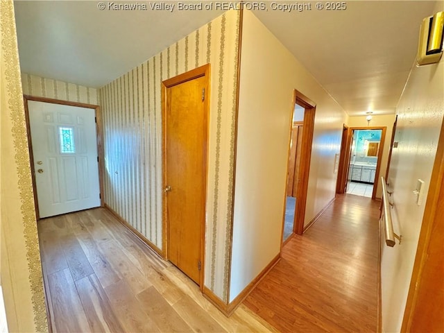 corridor featuring light wood-type flooring