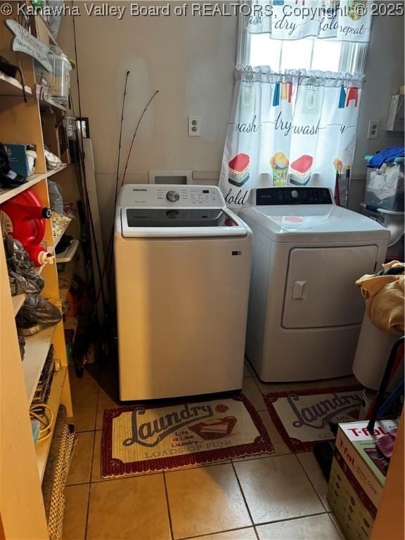 81 Amburgey Ln, Amherstdale, WV 25607 - washroom featuring laundry area, independent washer and dryer, and light tile patterned floors