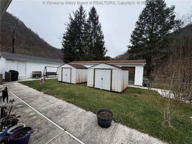 81 Amburgey Ln, Amherstdale, WV 25607 - view of shed featuring a mountain view