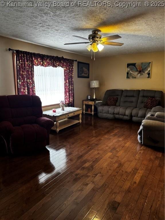 81 Amburgey Ln, Amherstdale, WV 25607 - living room featuring dark wood finished floors, a textured ceiling, and ceiling fan
