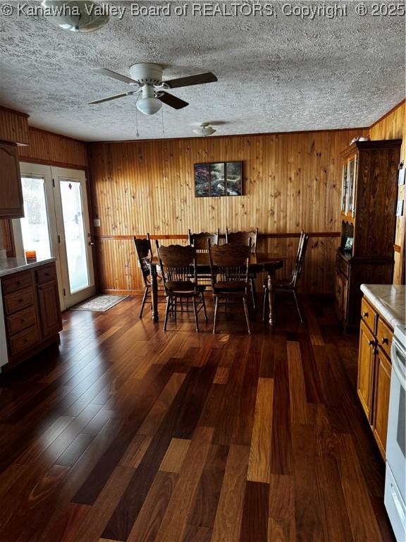 81 Amburgey Ln, Amherstdale, WV 25607 - dining area with a ceiling fan, a textured ceiling, and dark wood finished floors