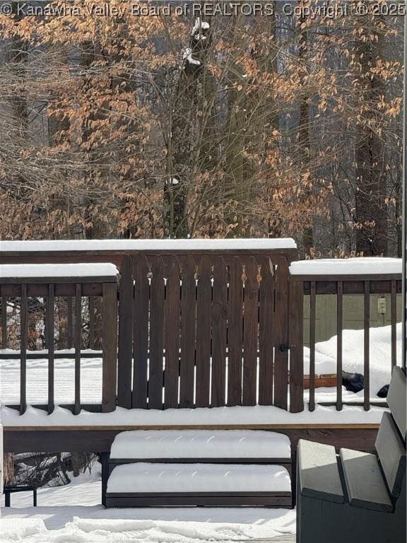 view of snow covered deck